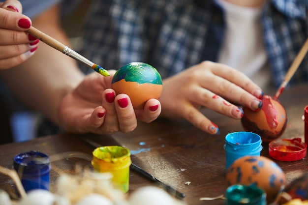 Mother and Child Painting Easter Eggs