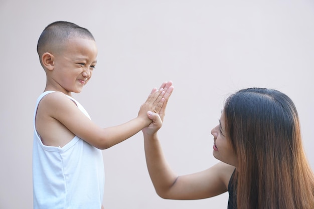 Mother and child playing happily