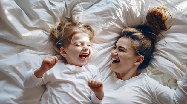 Mother and child sharing lighthearted moment of tickles and giggles on lazy Sunday morning in bed