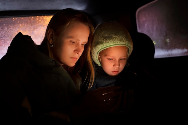 Mother and daughter in car