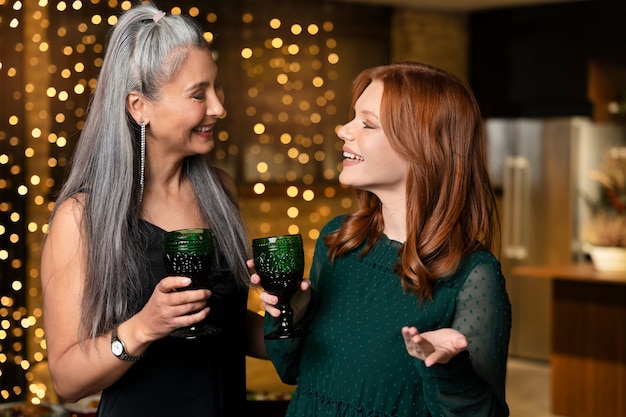 Mother and daughter enjoying a new year party