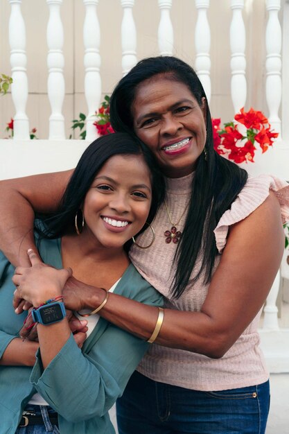 Mother and daughter laughing together