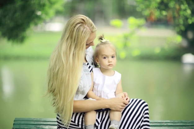 Mother and daughter look, seen from behind