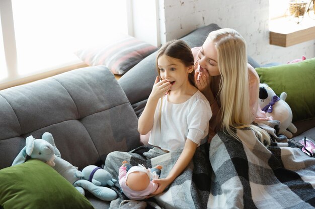 Mother and daughter, sisters have quite, beauty and fun day together at home