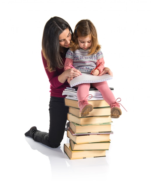 Mother and daughter studying together. back to school