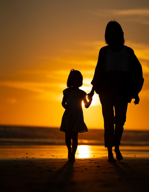 Mother and Daughter Sunset Silhouette