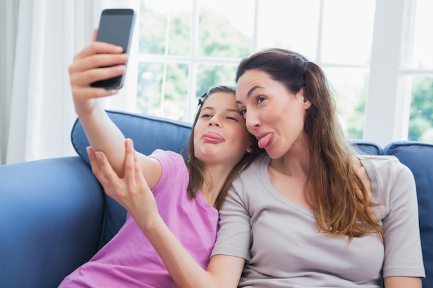 Mother and daughter taking a selfie