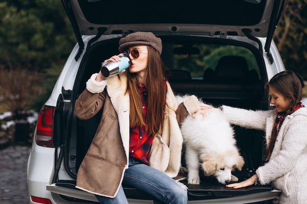 Mother and daughter with dog