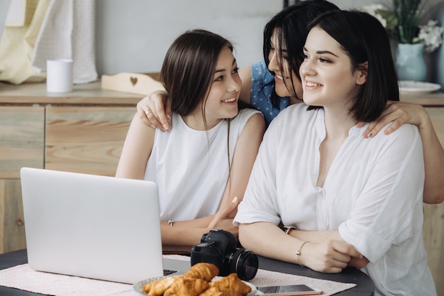 Mother and daughters having fun together