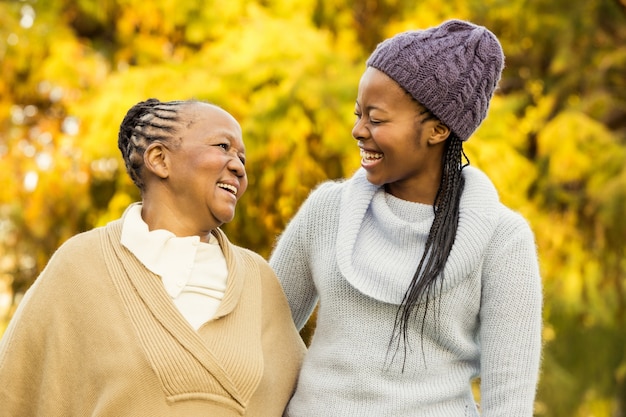 Mother and grandmother smiling to each other