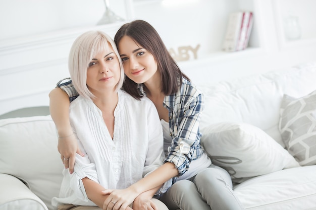 mother and her daughter together staying together