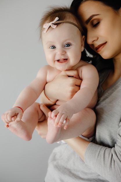 A mother holding her baby