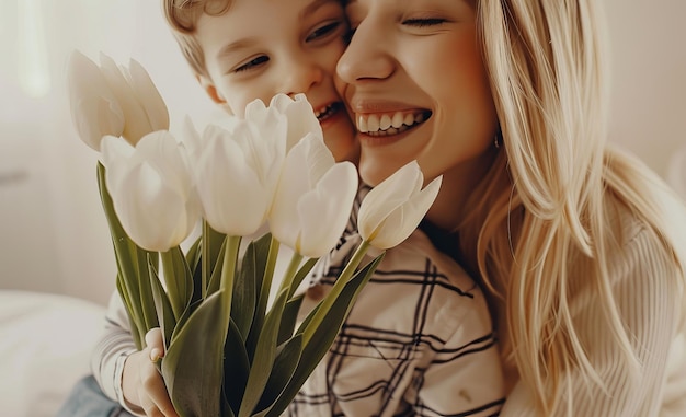 A mother hugging their son on mothers day with a bunch of flowers