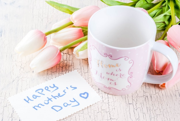 Mother's Day concept, greeting card background with flowers tulips