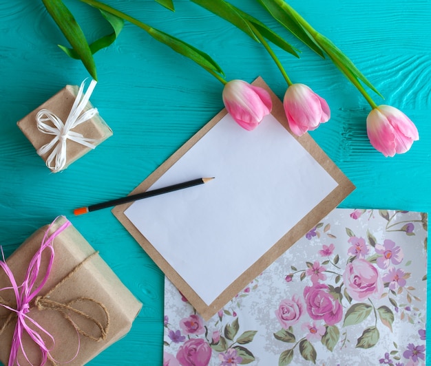 Mother's Day. Pink tulips and greeting card 