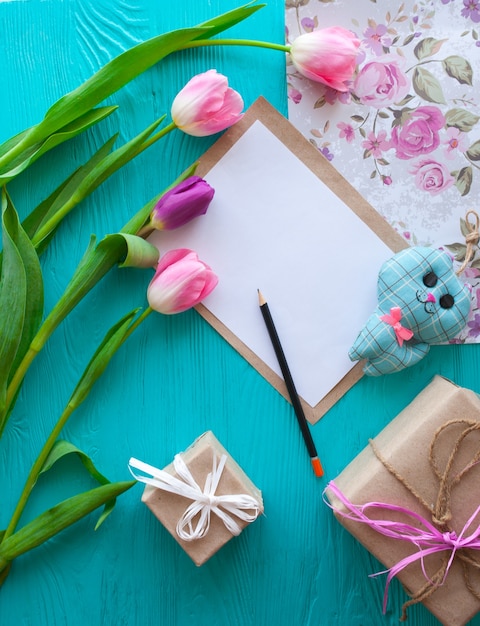 Mother's Day. Pink tulips and greeting card 