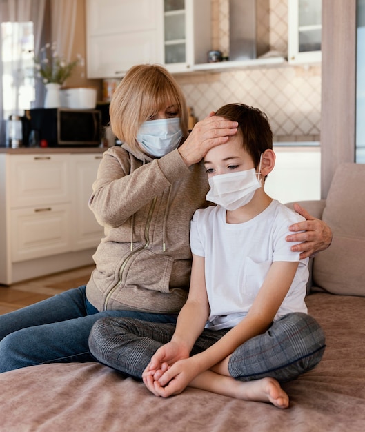 Mother and son wearing mask