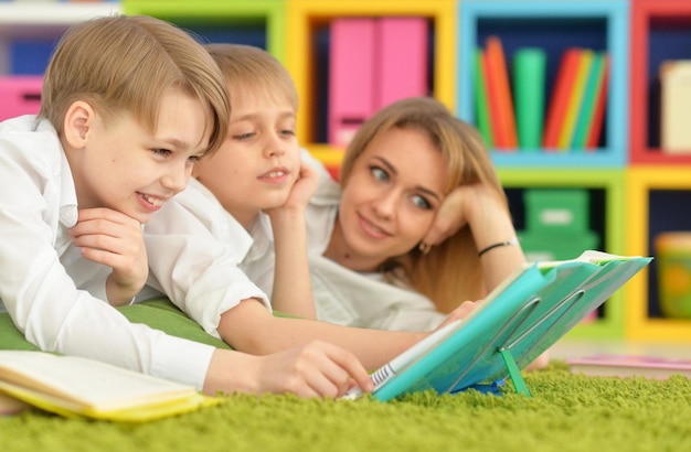 Mother and sons doing homework