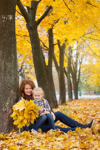 Mother with daughter outdoors