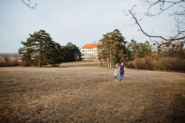 Mother with doughter at Valtice park Czech Republic