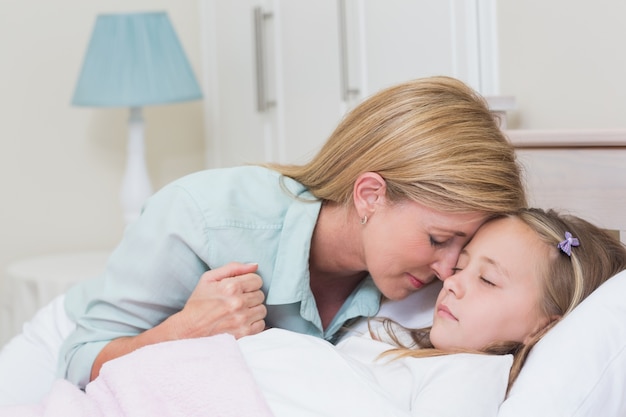 Mother with her slipping daughter 