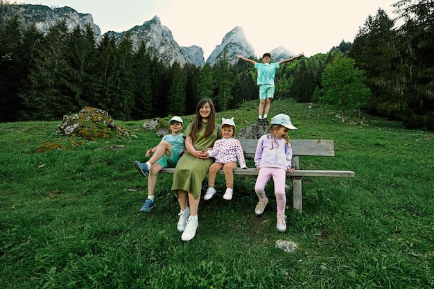 Mother with kids at Vorderer Gosausee mountains Gosau Upper Austria