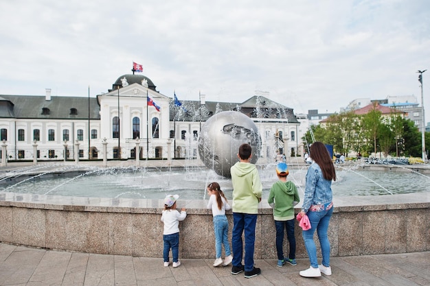 Mother with kids walking at Grassalkovich Palace Bratislava Europe Residence of the president of Slovakia in Bratislava