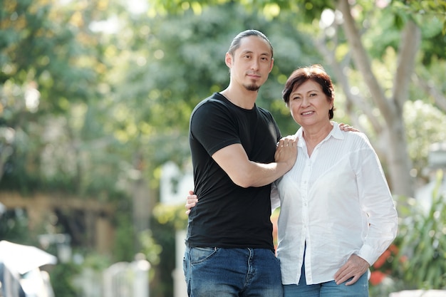 Mother with son outdoors