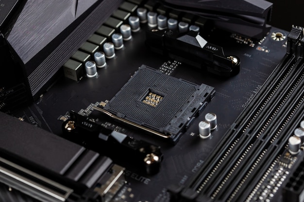 Motherboard on a table  showing chips circuit boards and components