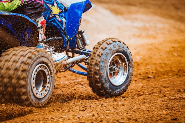 Motion blur of mountain bikes race on dirt track