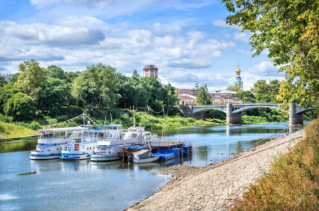 Motor ships at the pier on the river in Vologda on a summer sunny day