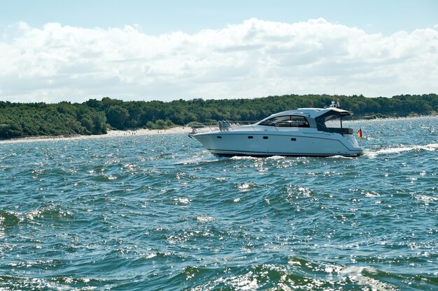 Motor yacht in the sea ocean yacht on blue waves