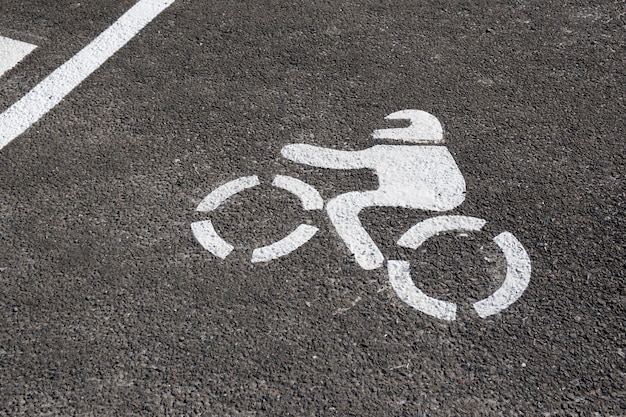 Motorcycle parking space on outdoors. MotorBike sign painted on asphalt