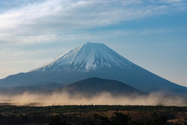 Mount Fuji with natural fine sand flying up in the air