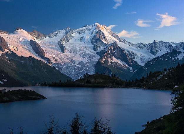 Mount mont blanc covered in the snow With ALake evening in Chamonix