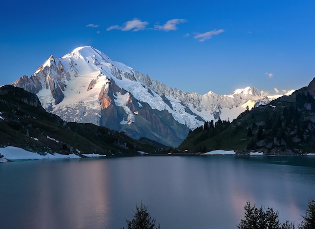 Mount mont blanc covered in the snow With ALake evening in Chamonix