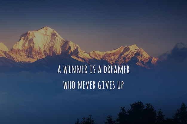 Mountain background with inspirational quotes text A winner is a dreamer who never give up