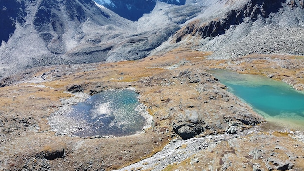 Mountain glacier lake Picturesque hidden location in the mountains Outdoors style vacation Adventure travel in the wildlife no people Mountain valley landscape aerial view stock photo