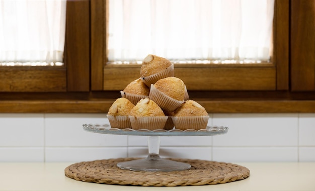 Mountain of homemade madeleines on the kitchen table