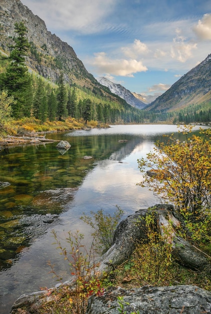 Mountain lake in autumn morning reflection