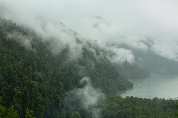 Mountain lake in the fog