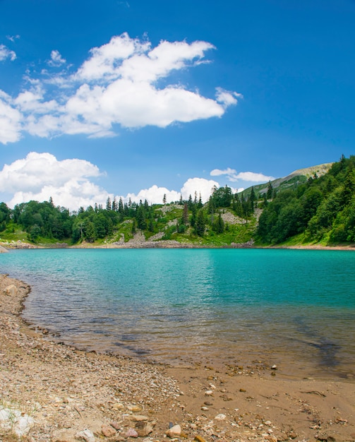 Mountain lake in a valley in Georgia on a summer day