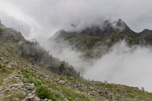 Mountain Landscape in the Pyrenees, France Rocky mountains between the fog