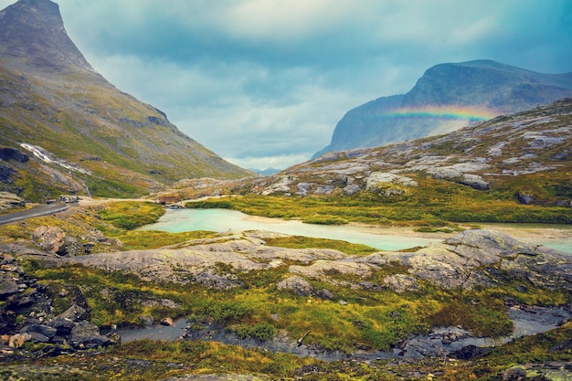 Mountain landscape Rocky shore of mountain lake in rainy autumn morning Beautiful nature Norway