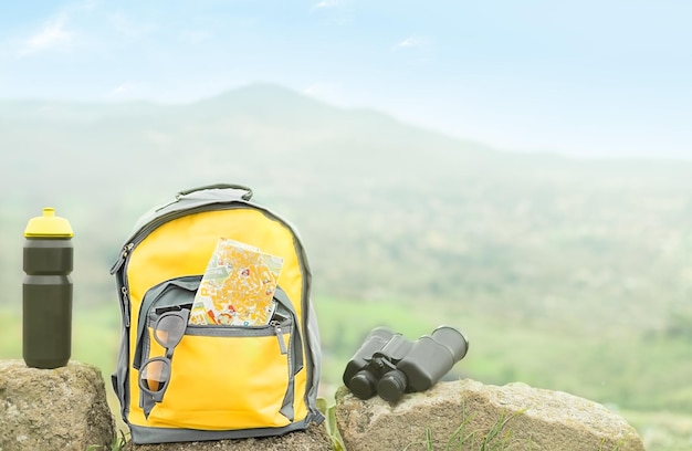 Mountain landscape with backpack