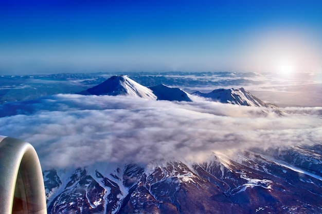 Mountain landscape with volcano View from the airplane window