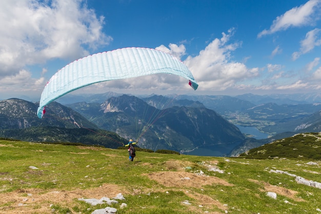 Mountain panorama with paraglider