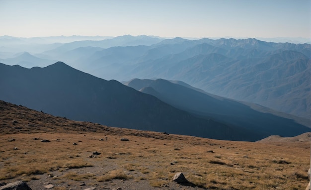 Mountain peaks fading into the distance clear sky and slight haze