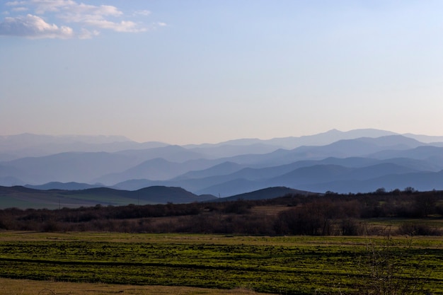 Mountain range landscape during sunset, view of mountain and hill lines