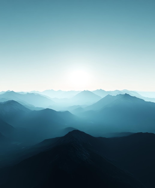 Photo mountain range with misty peaks blue sky and soft sunlight featuring turquoise tones